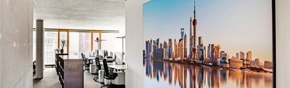 DIU Muenster office with photo of Shanghai 