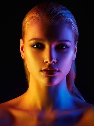 Face of a woman in different lights