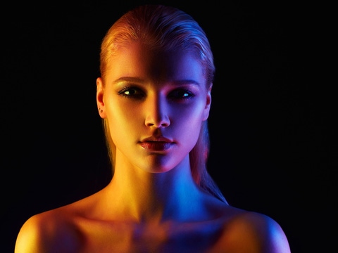 Face of a woman in different lights Face of a woman in different lights